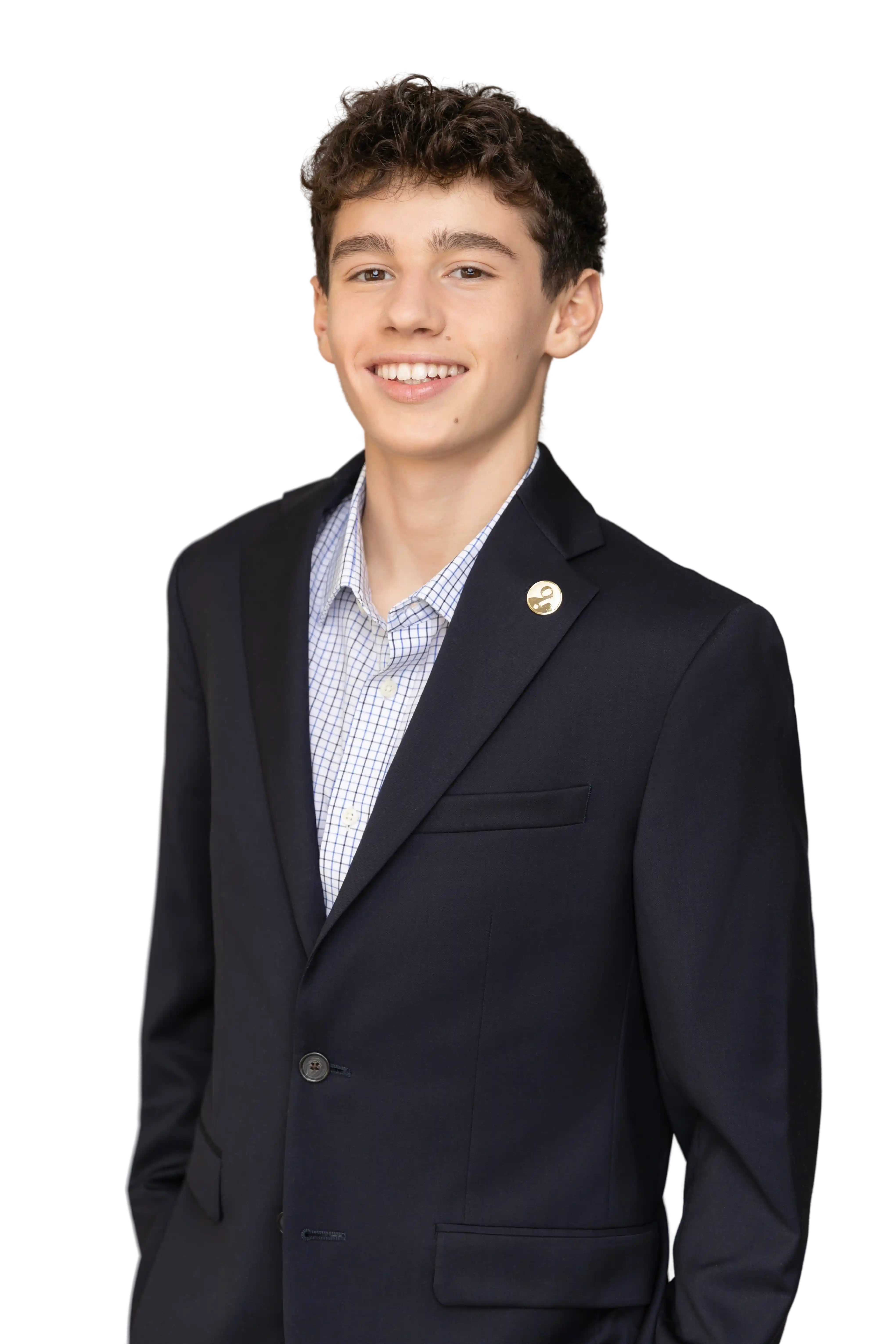 Ignacio Revello with glasses looking and smiling at camera